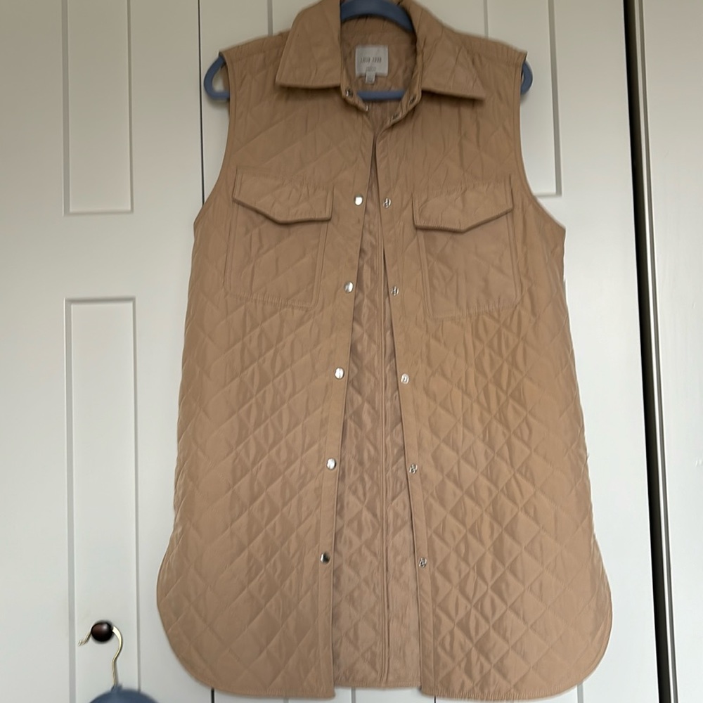 Ladies sleeveless topper. Quilted
